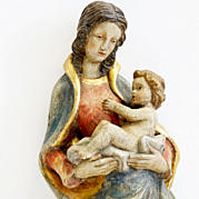 Madonna mit Jesuskind, Holz, geschnitzt, farbig gefasst / polimentvergoldet.